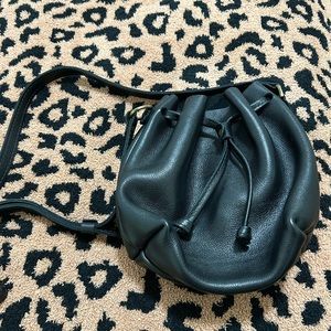 Portland Leather “Almost Perfect” pebbled black bucket bag